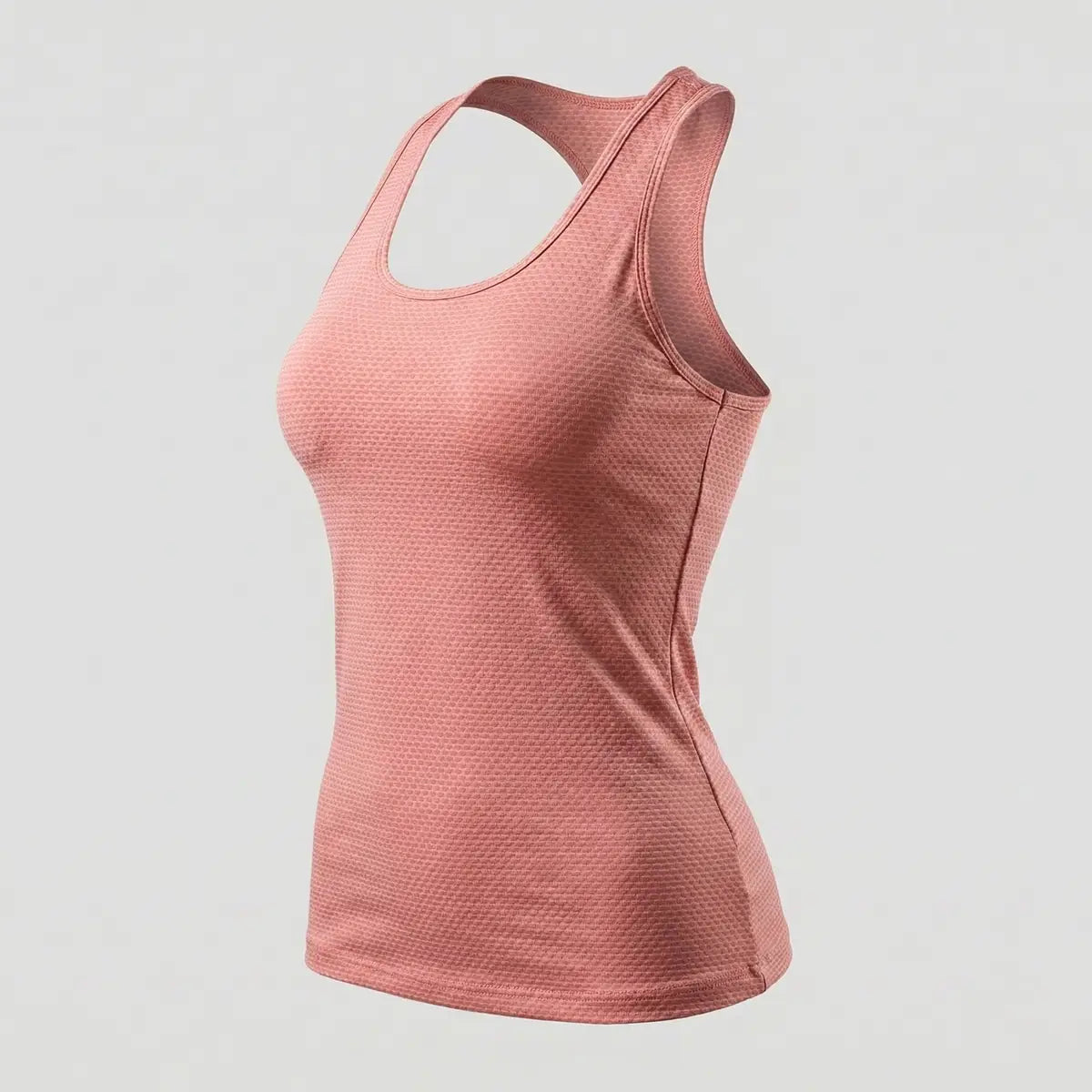 Top deportivo mujer sin mangas color rosa viejo tejido texturizado transpirable vista lateral