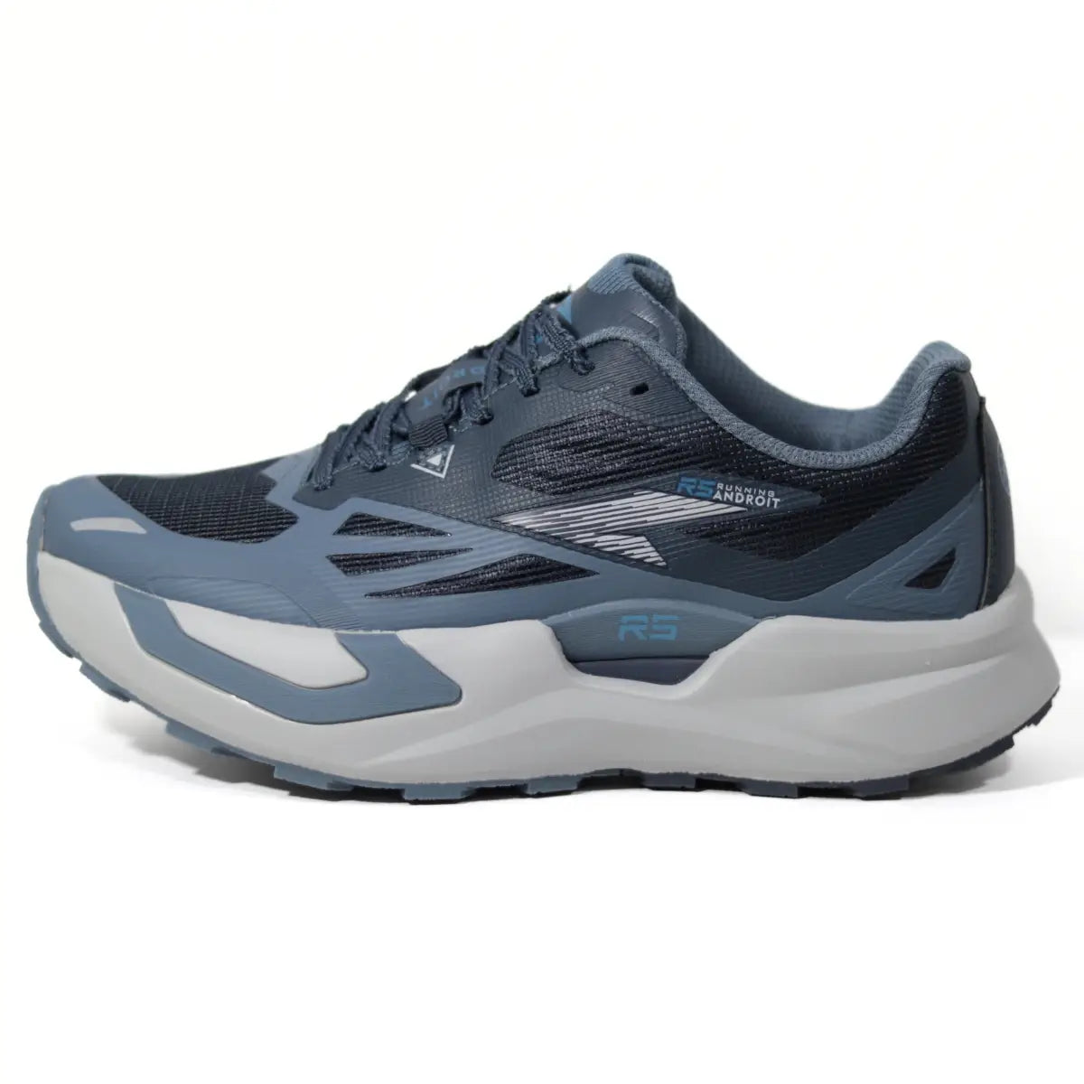 Perfil lateral externo de zapatillas deportivas hombre RS Performance Androit en color azul con entresuela gruesa