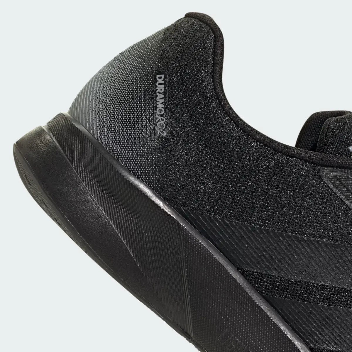 Detalle del talón texturizado y logotipo en las zapatillas running hombre Adidas Duramo RC2 M negras