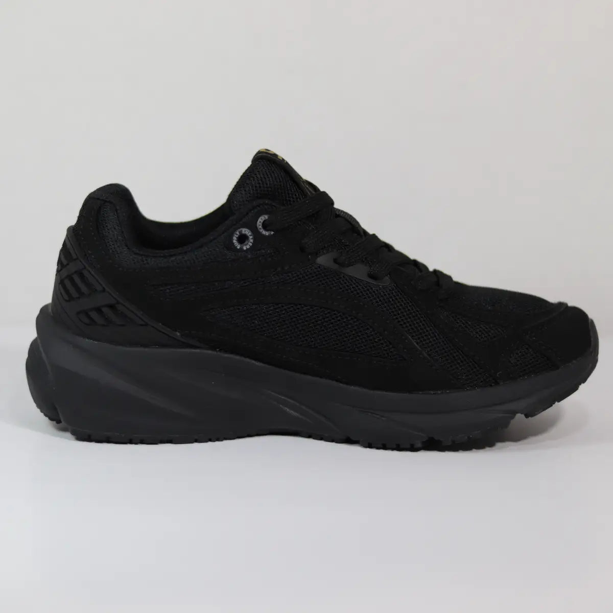 Vista lateral interna zapatillas negras mujer diseño chunky de malla transpirable