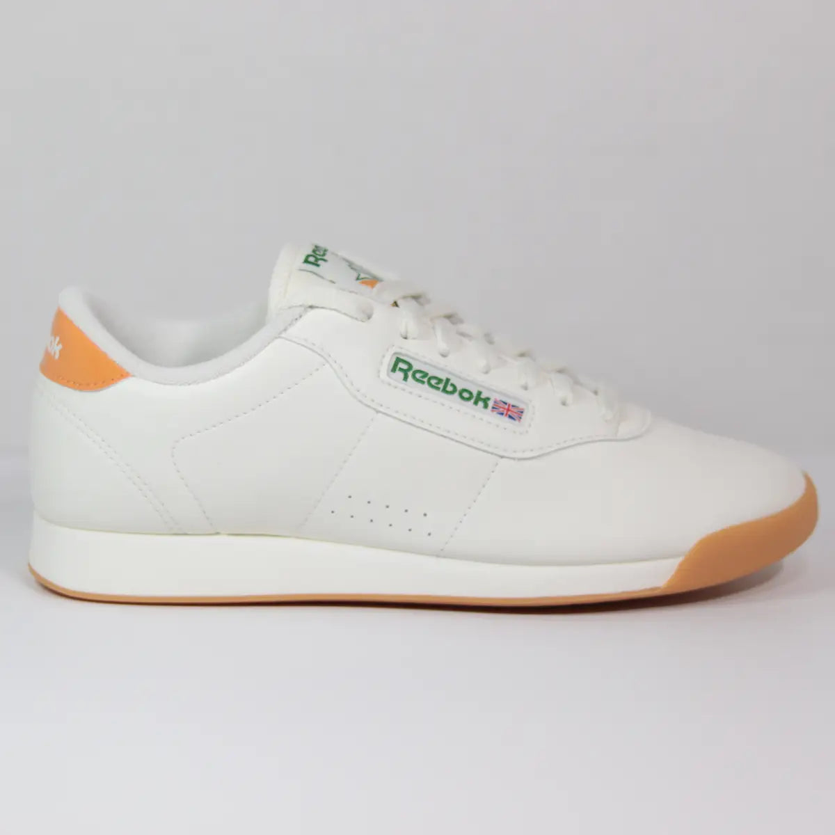 Zapatillas casuales mujer Reebok Princess Classic blancas perfil lateral externo con logo retro