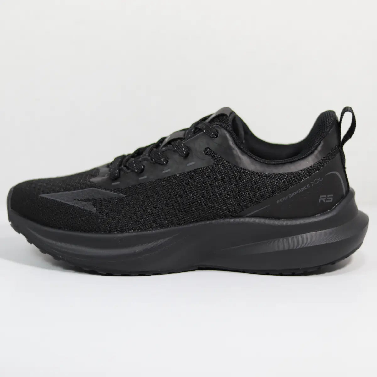 Zapatillas deportivas mujer RS Performance Wonder Women perfil negro aerodinámico
