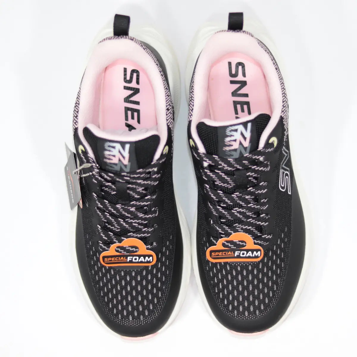 Vista superior frontal zapatillas mujer negras entresuela blanca esculpida y plantillas rosa