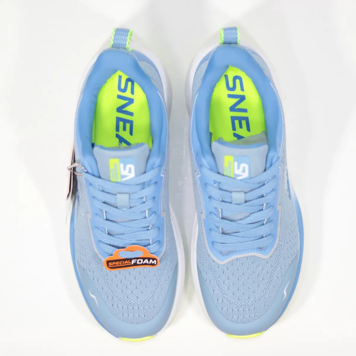 Vista superior frontal zapatillas mujer celestes entresuela blanca esculpida y plantillas neón