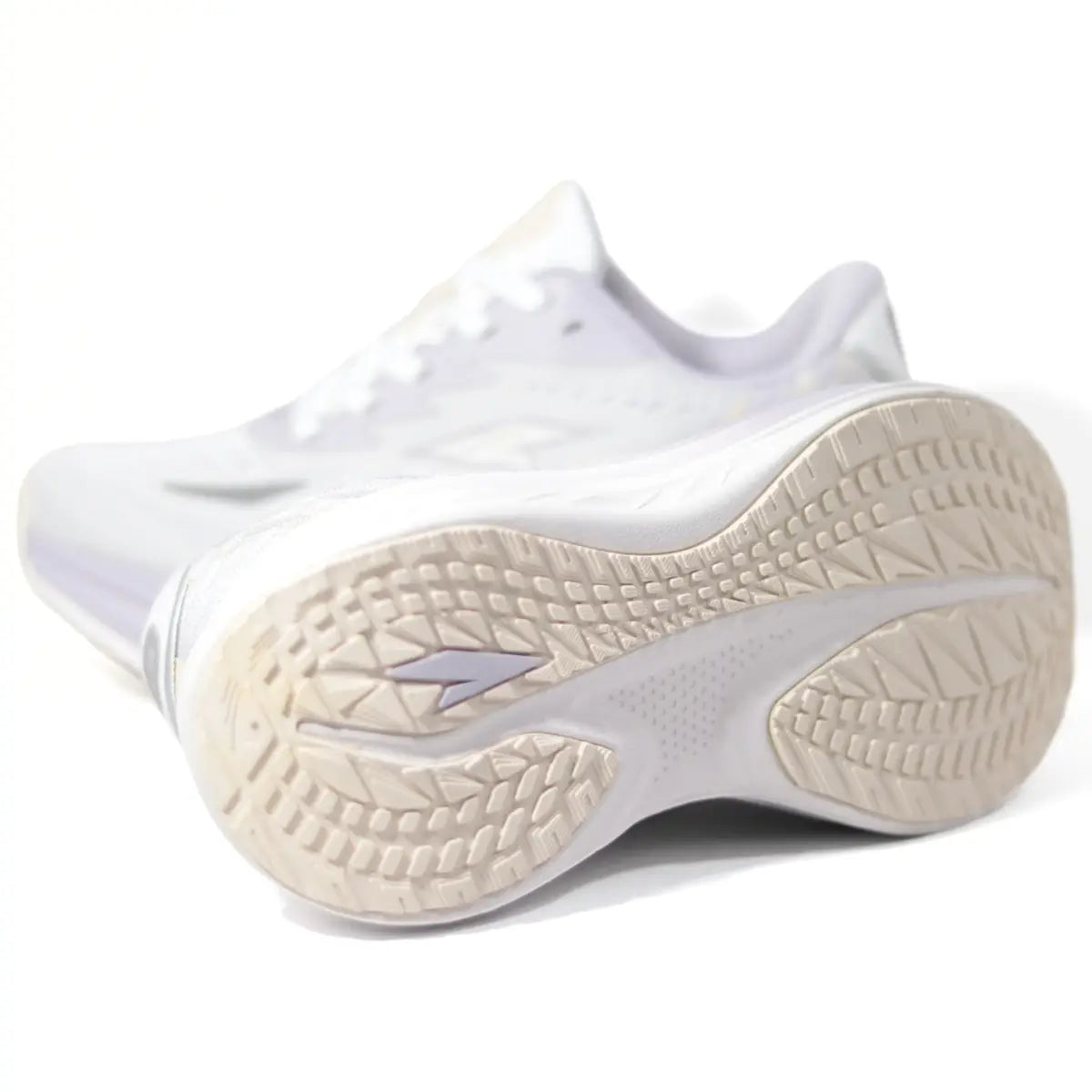 Suela de zapatillas RS Performance Swift mujer beige lila mostrando diseño de tracción antideslizante local