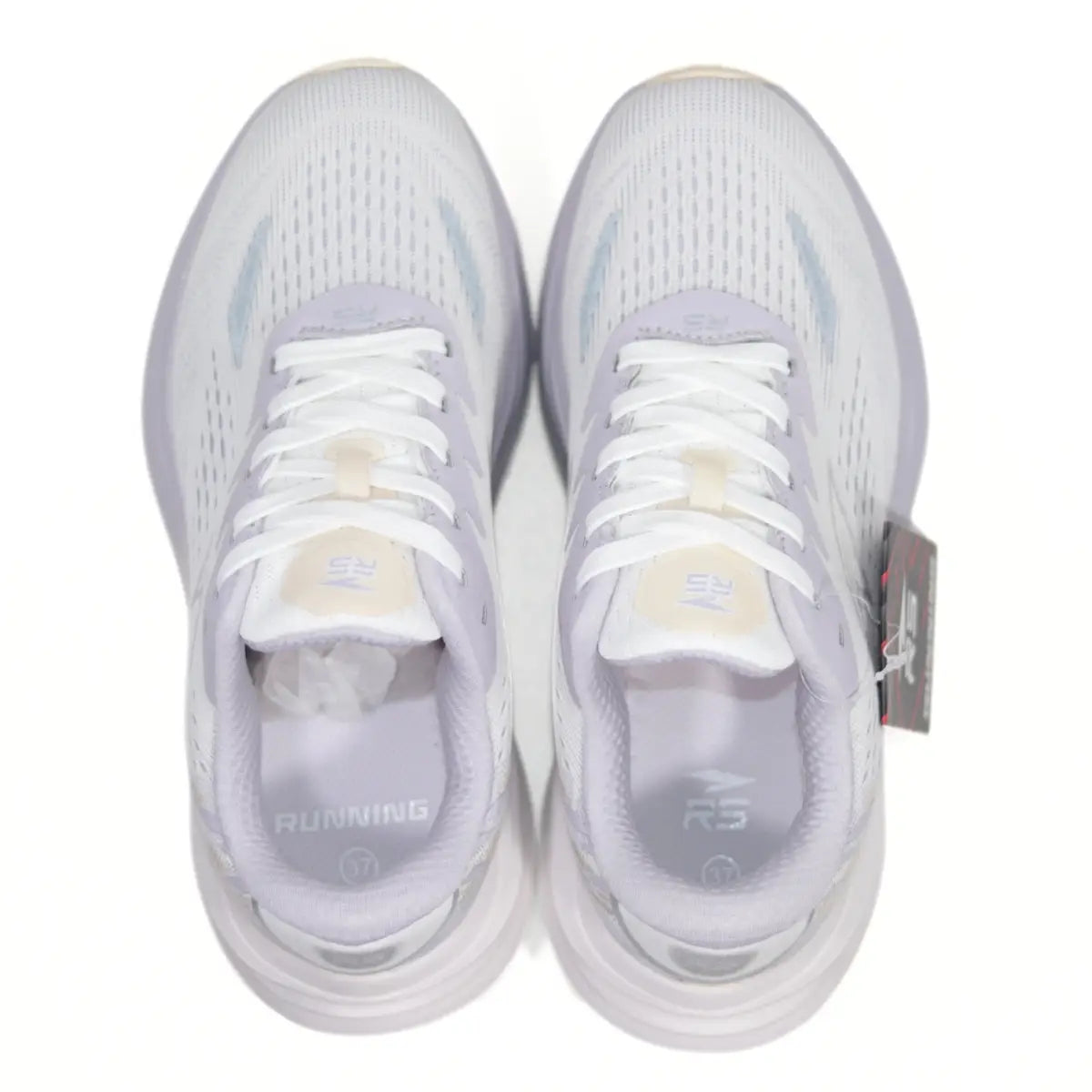 Vista superior interior de zapatillas RS Performance Swift mujer beige lila, mostrando la lengüeta acolchada y el ajuste preciso de los cordones